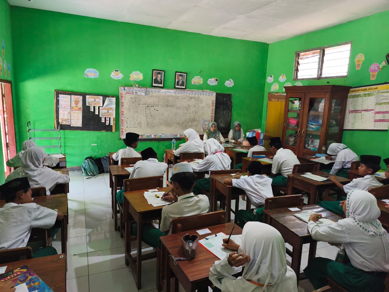 MI WACHID HASYIM WONOMLATI